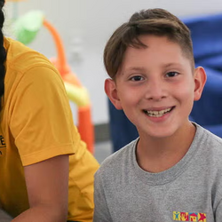 A child smiles for the camera